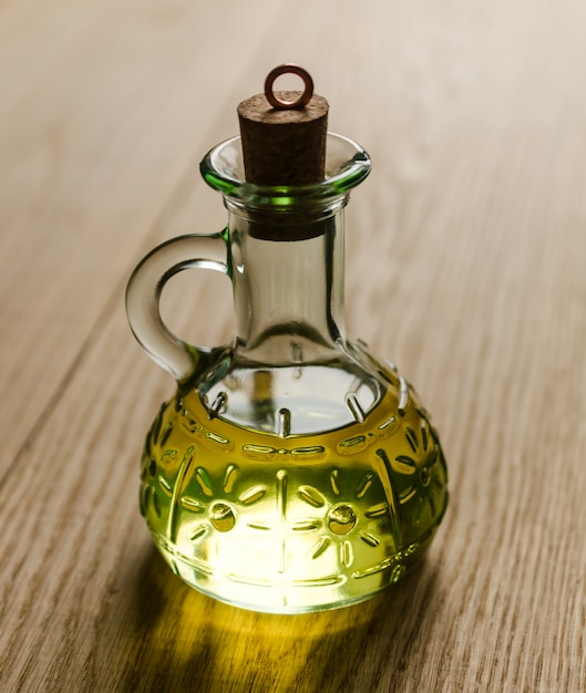 Small bottle of olive oil with cork stopper