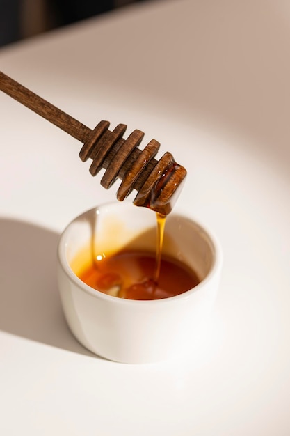 Small bowl of honey on a table