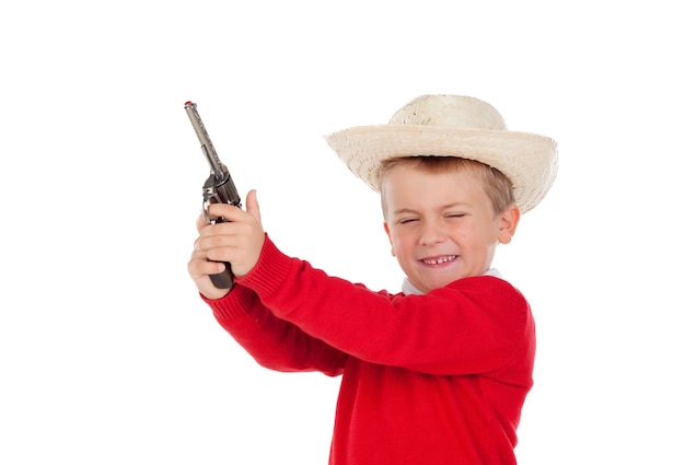 Small boy playing with a gun 