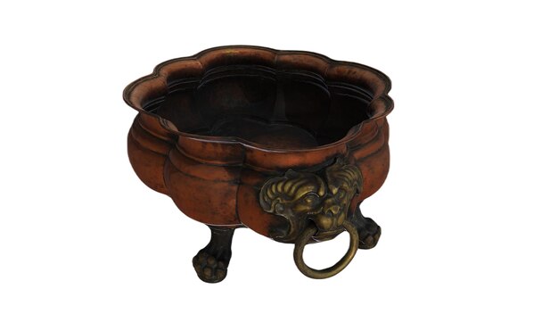 A small bronze pot with a lion's head on it.