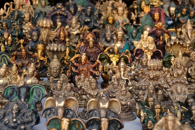 Small bronze statuettes on the street market in Rishikesh India