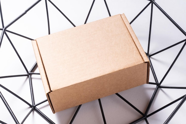 Small brown cardboard box for item shipping mock up