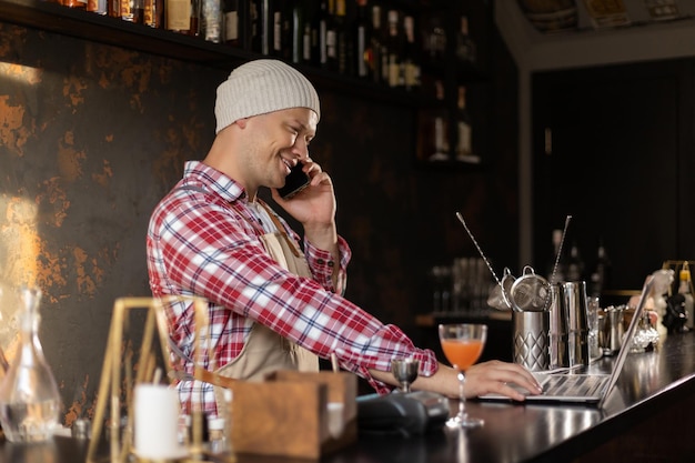 Small business owner working at his cafe