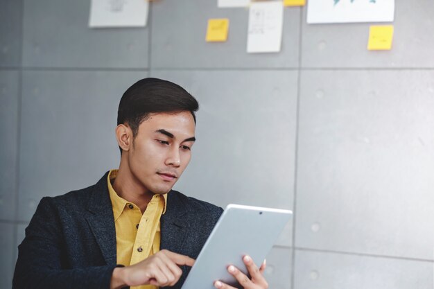 Small Business and Strategy Concept. Young Businessman in Office Meeting Room