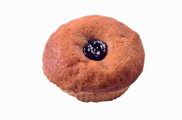 A small cake with a blueberry on top