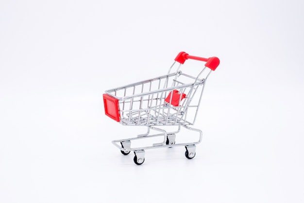 Small cart with red handle on white background.