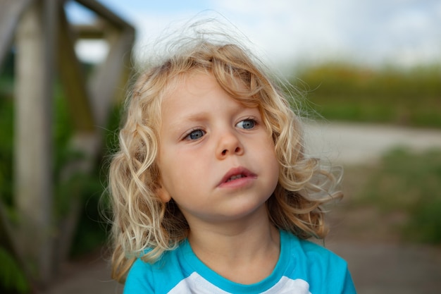 Small child enjoying of a sunny day