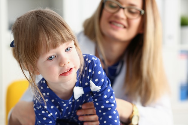 A small child is afraid in the hospital room