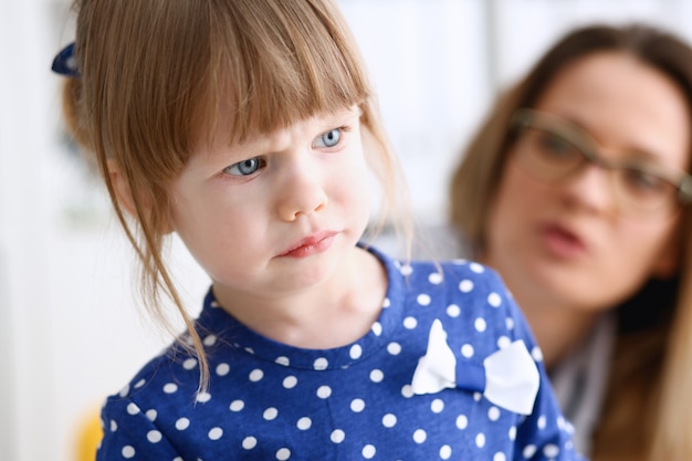 A small child is afraid in the hospital room