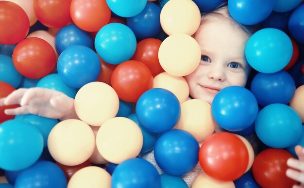 A small child is playing with toy