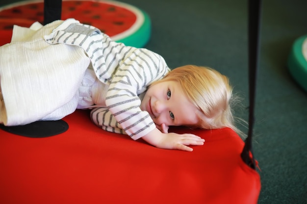 A small child is playing with toy