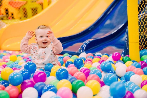 Small child playground slide lot colorful balls