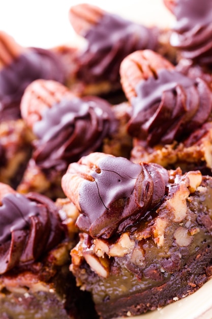 Small chocolate pecan squares at dessert bar.