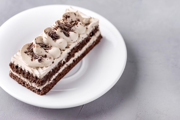 Small Coffee Chocolate Cake on White Plate Grey Background Tasty Beautiful Dessert