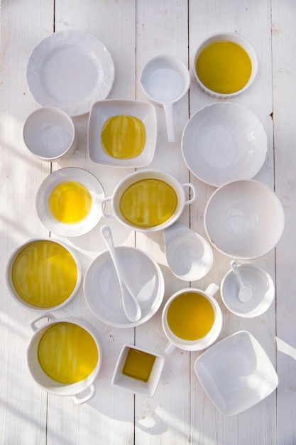 Photo small containers with extra virgin olive oil