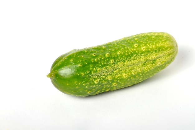 Small cucumber on a white background