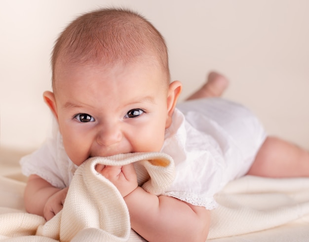 Small cute newborn baby infant teething