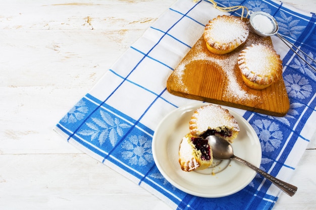 Small dessert pie on the white plate