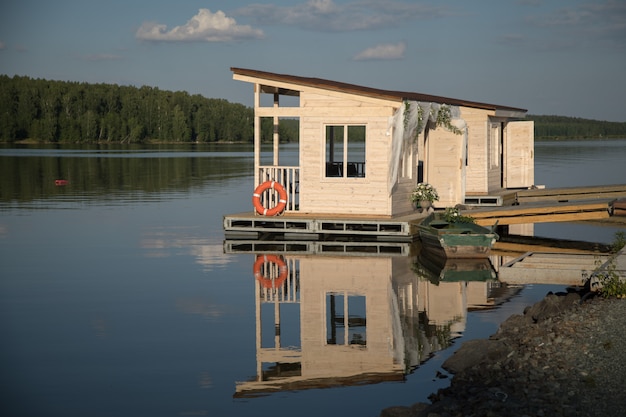 Small dock house on lake