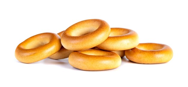 Small dry bagels, small rolls on a white. Food.