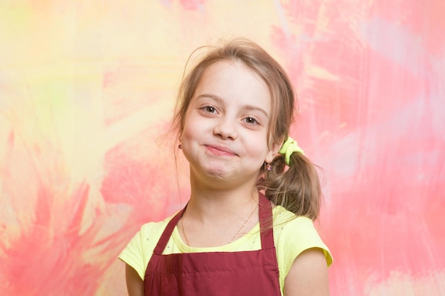 Small girl on colorful background