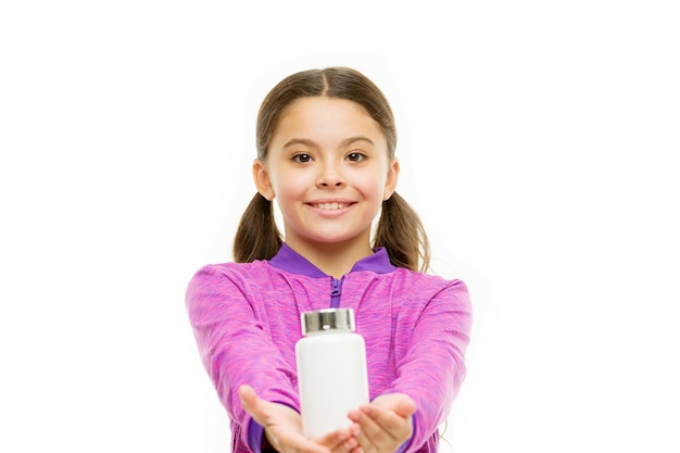 Small girl share pills small child isolated on white pills for healthy growth food additives complex healthy sporty kid vitamin jar happy childhood Most important vitamins Who cares about diet