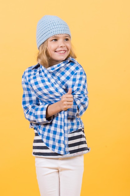 Small girl smile in hat shirt and pants fashion