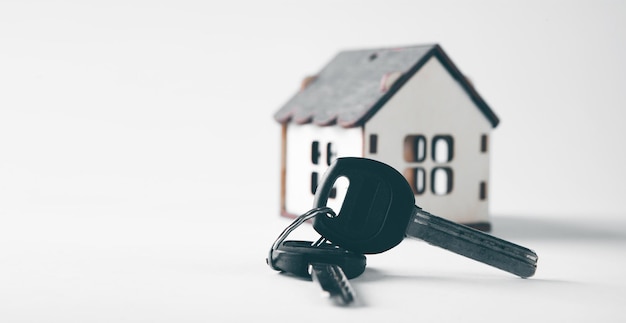 Small house and keys on the table