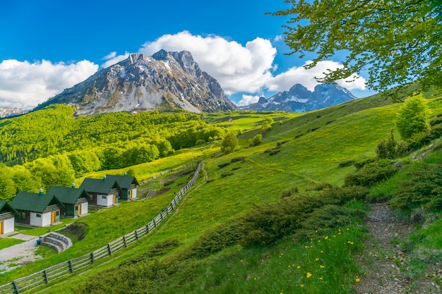 Small houses at the foot of the mountain for a holiday in Montenegro. Komovi.