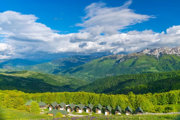 Small houses at the foot of the mountain