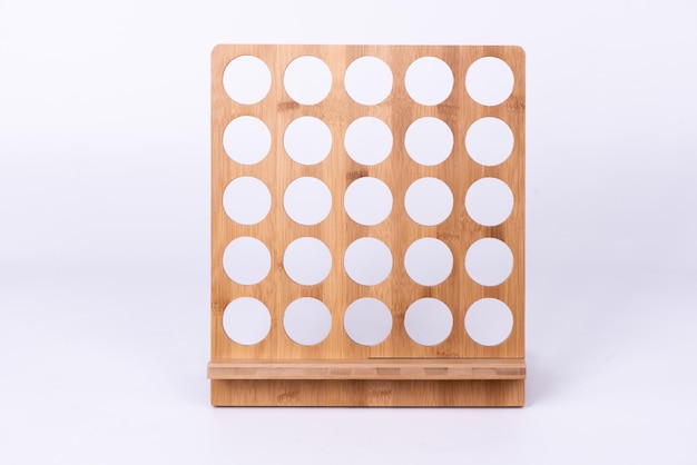 The small item storage rack made of bamboo is on a white background