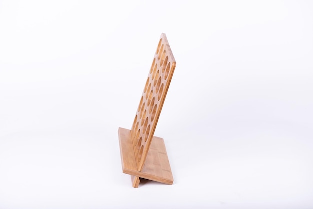 Photo the small item storage rack made of bamboo is on a white background