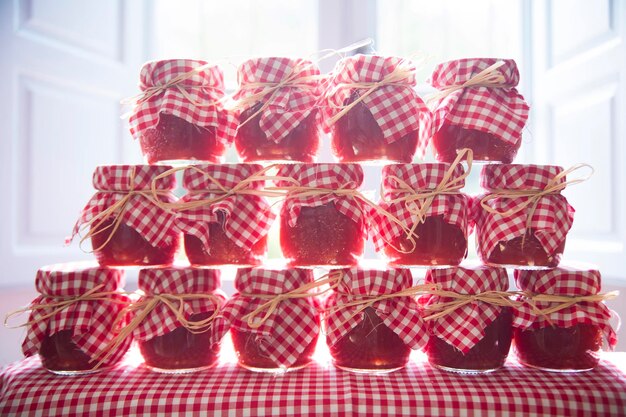 Photo small jars of tomato sauce