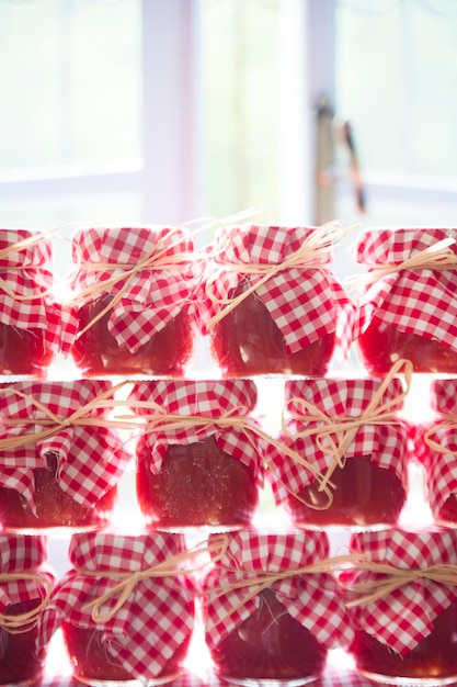 Photo small jars of tomato sauce