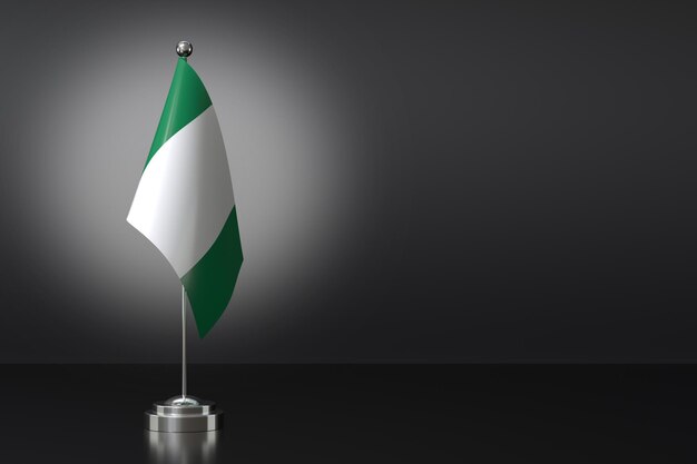 사진 검은색 배경에 나이지리아 연방 공화국의 작은 국기 3d 렌더링