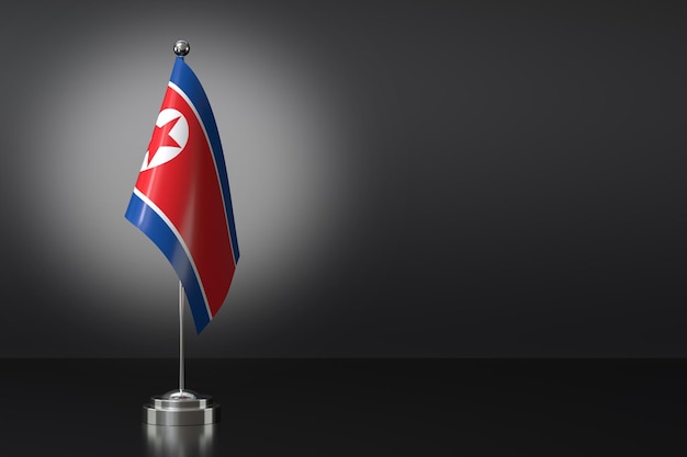 Small North Korea Flag in Front of Black Background 3d Rendering