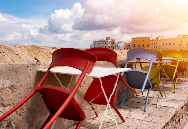 Small outdoor cafe on sea coast in Italy in summer