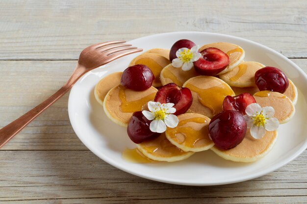 Small pancakes with cherries