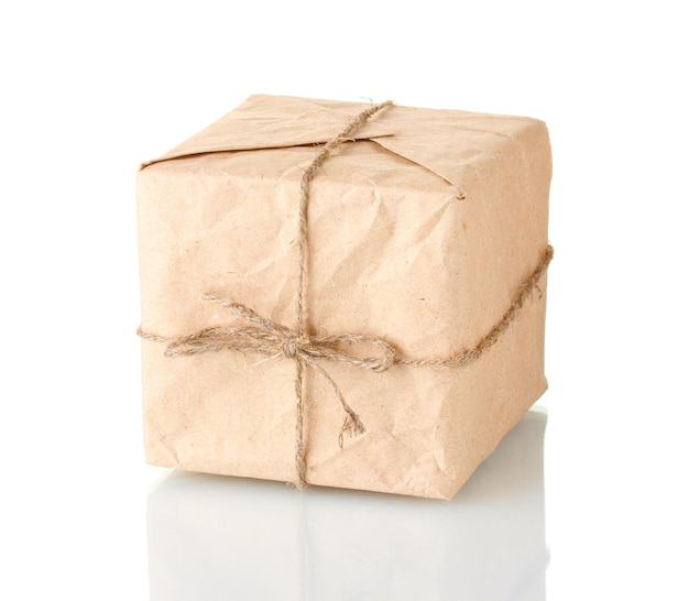 Small parcel wrapped in brown paper tied with twine isolated on white