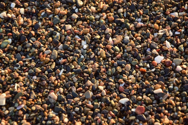 Small pebbles on the ocean coast clouseup Antofagasta Chile