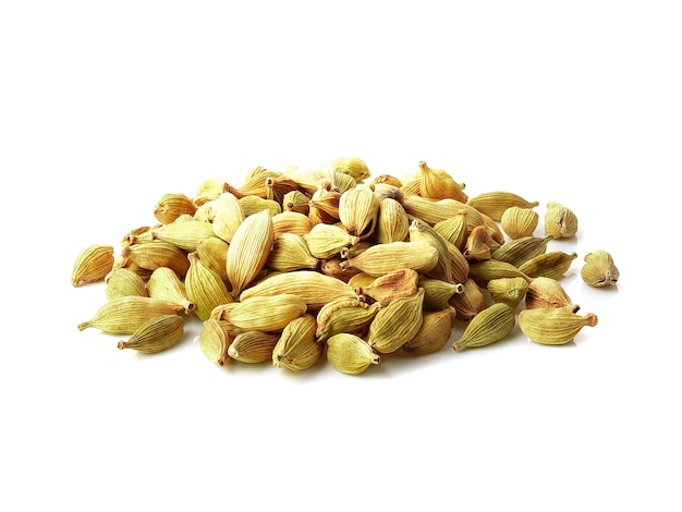 Small pile of green cardamon seeds isolated on the white background