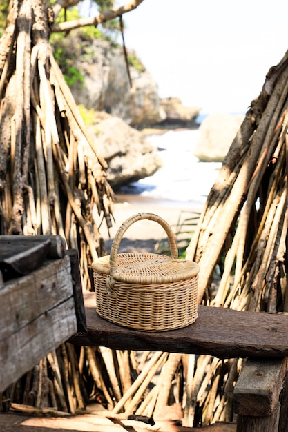 Small Rattan Picnic Basket on the Beach