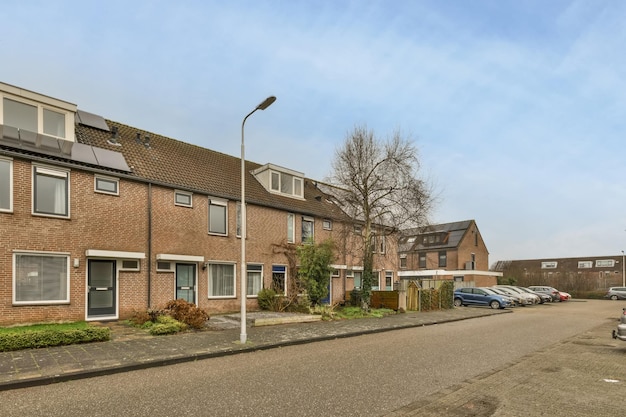 A small residential brick house with a lawn