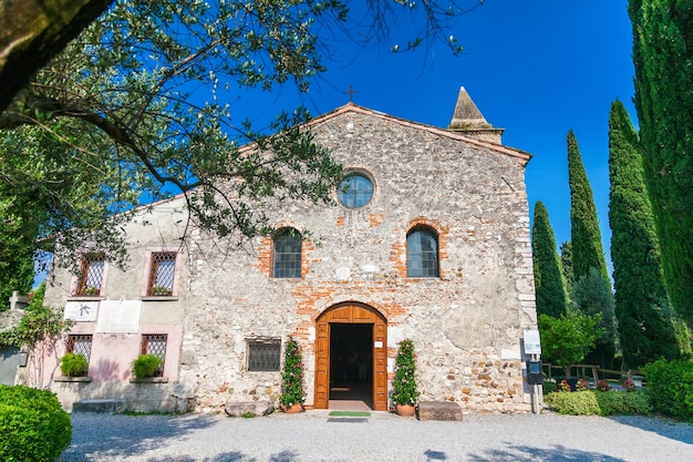 Small romanesque church of San Pietro in Mavino in Sirmione, Lake Garda, Italy