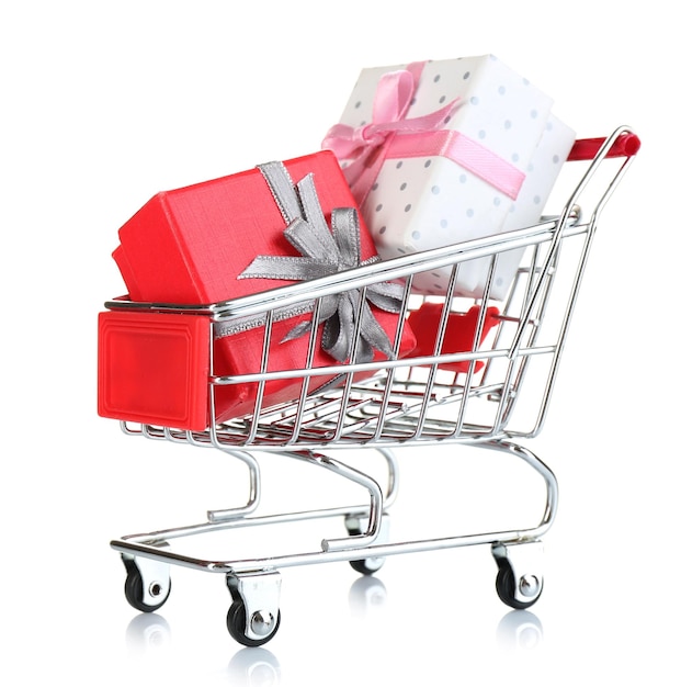 Small shopping cart full of gifts, isolated on white