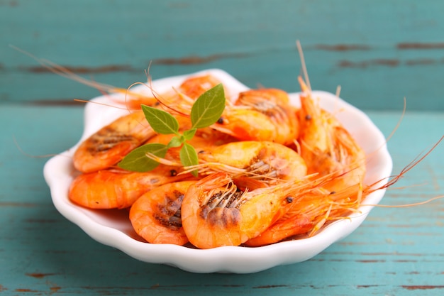 Small shrimp (crustaceans) in a blue background. traditional Odessa cuisine