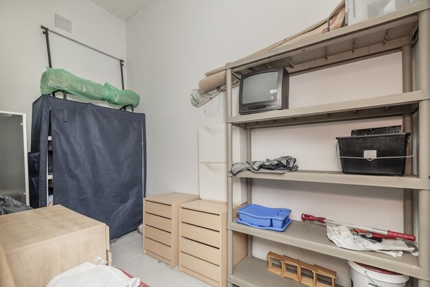 A small storage room with shelves a