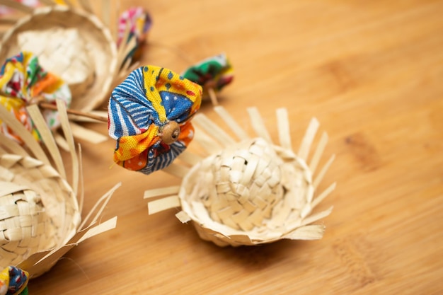 Small straw hats with Brazilian junina party decorations