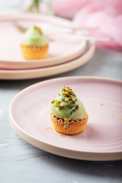 Small tasty cakes with pistachio mousse