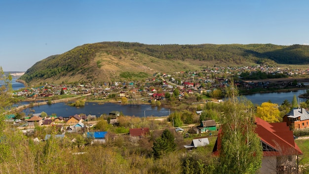 Small town of the river and mountains.